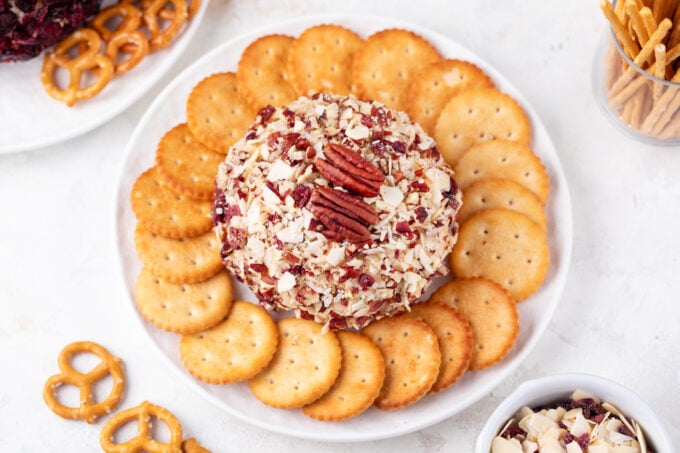 Cacon and cheese cheese ball covered with nuts.