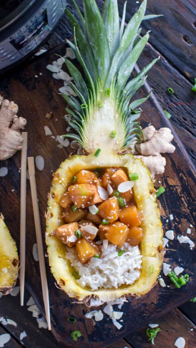 Photo of pineapple chicken over white rice. 