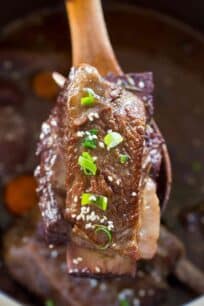 Instant Pot Short Ribs are juicy and fall of the bone, cooked in the most amazing garlic and wine sauce, and ready to eat in just 2 hours!