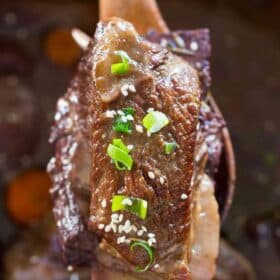 Instant Pot Short Ribs are juicy and fall of the bone, cooked in the most amazing garlic and wine sauce, and ready to eat in just 2 hours!