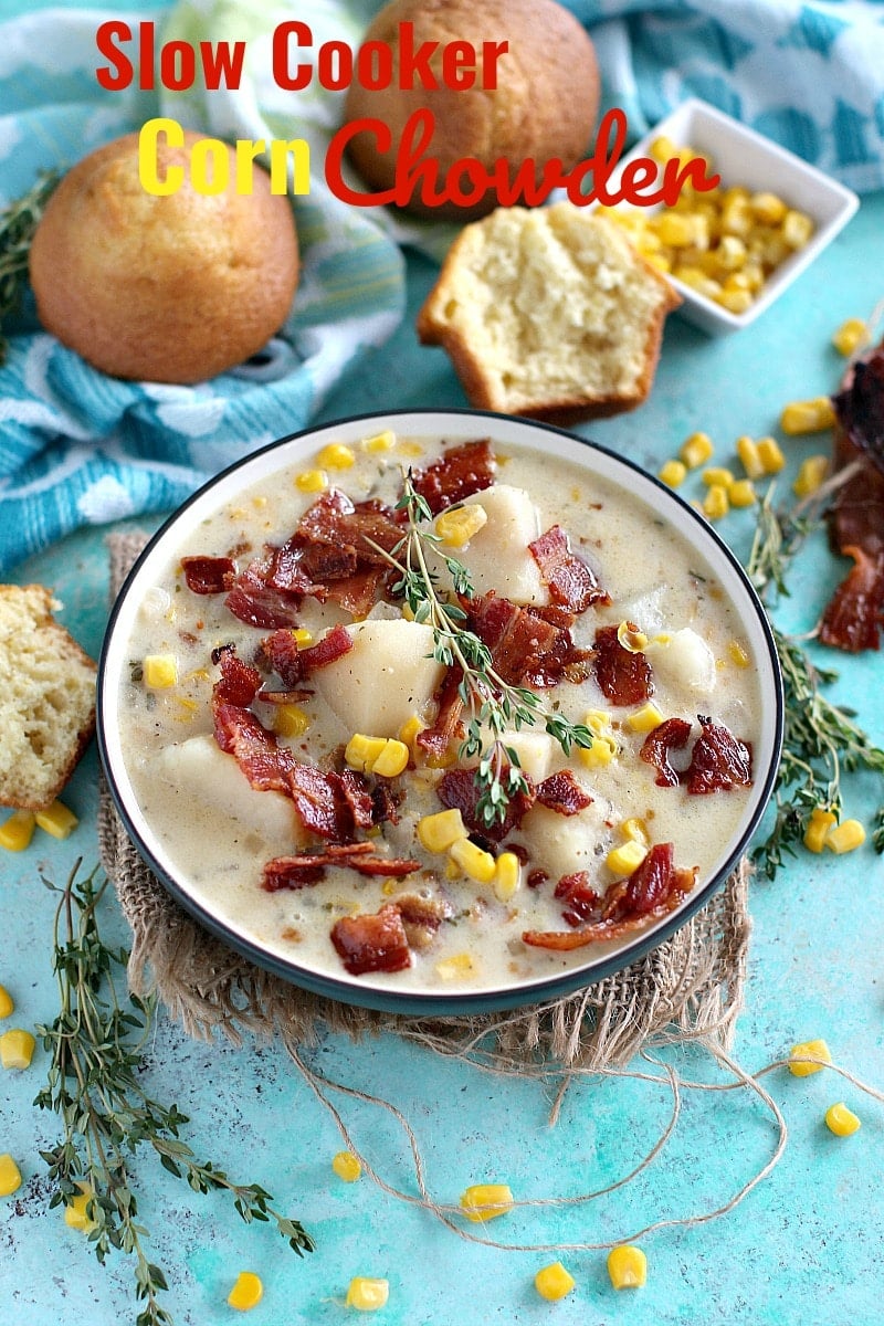 Creamy corn chowder soup topped with crunchy bacon and fresh herbs