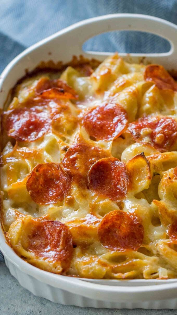 Photo of white pizza casserole with pepperoni.