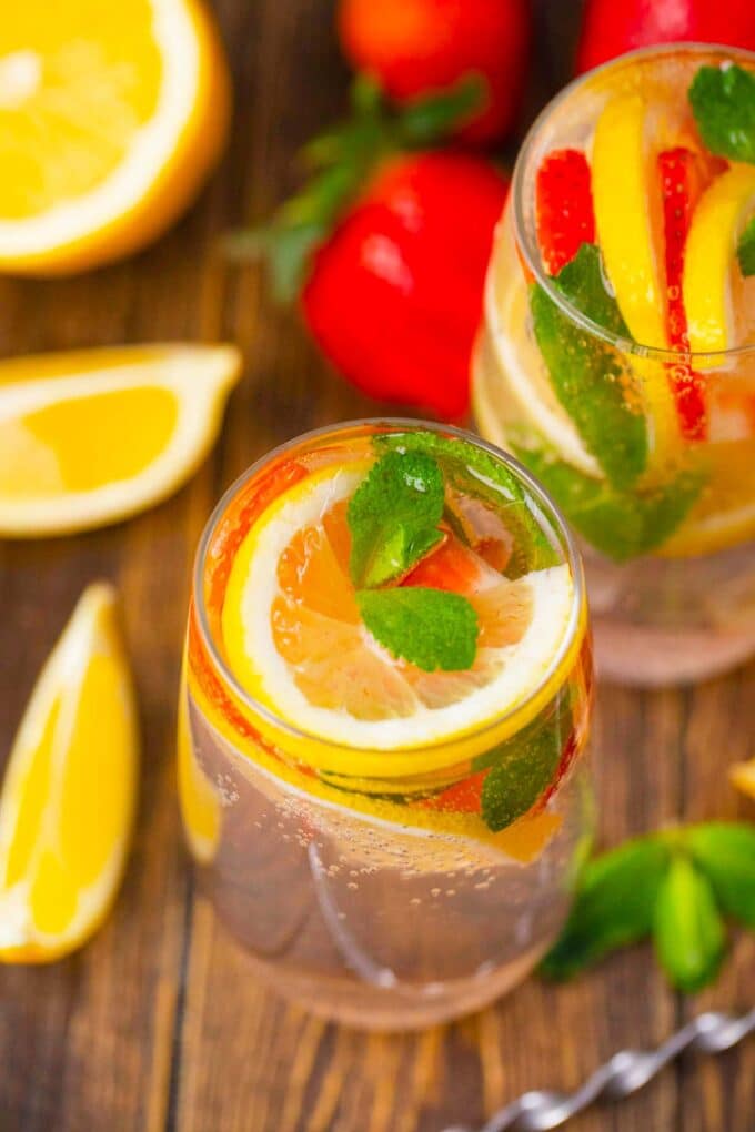 refreshing strawberry lemonade vodka club soda garnished with fresh strawberry