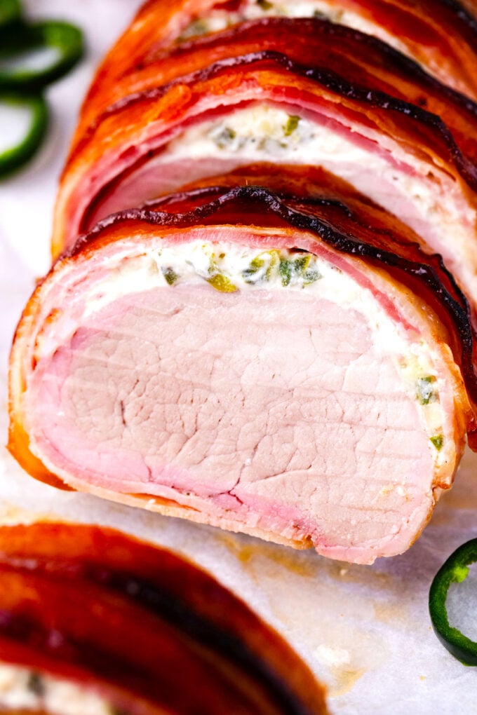 Bacon wrapped pork tenderloin with a cream cheese layer.