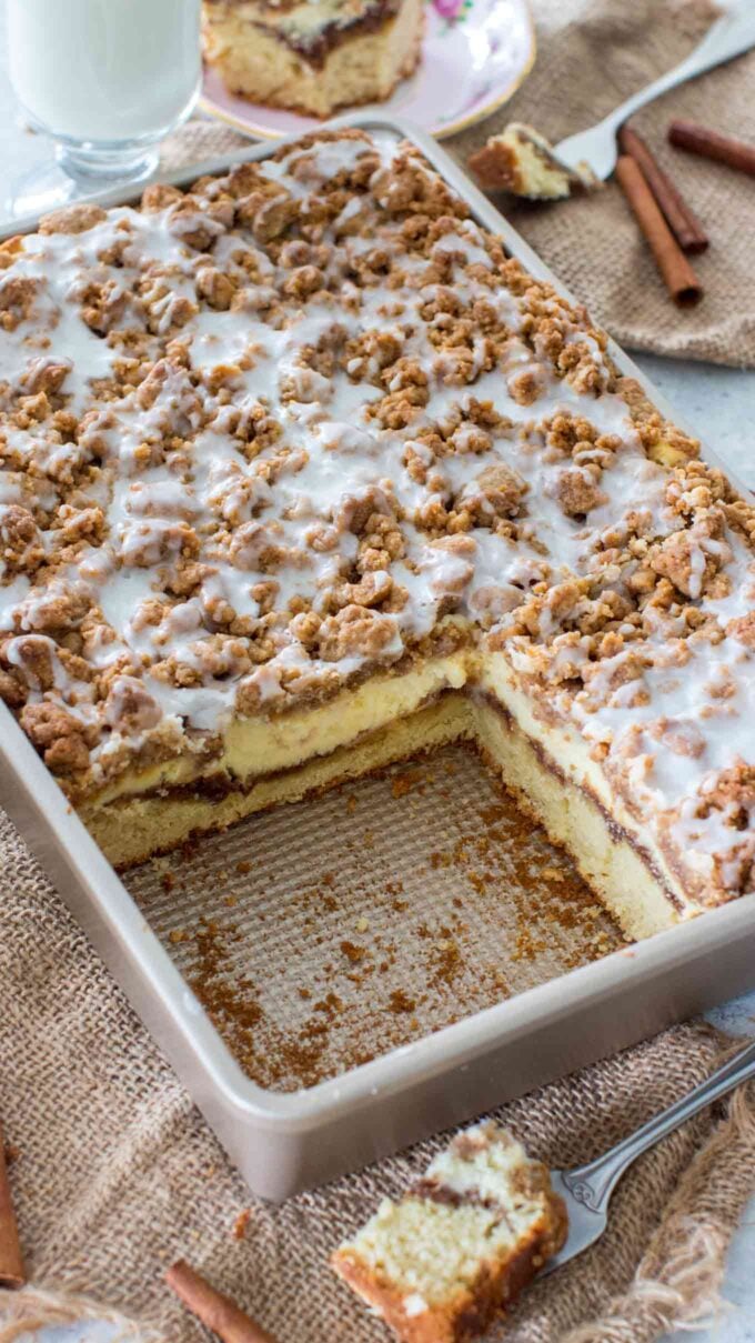 image of coffee cake with cream cheese and streusel topping on a baking pan