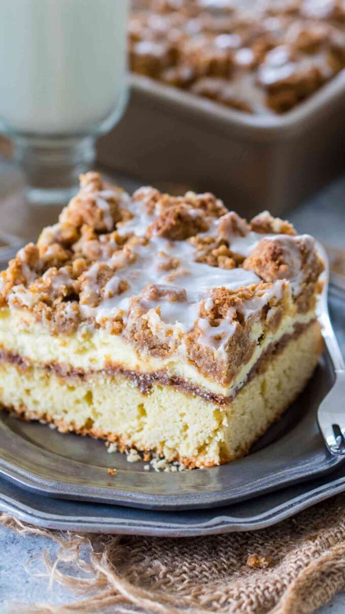 image of sliced coffee cake with streusel topping on a silver plate