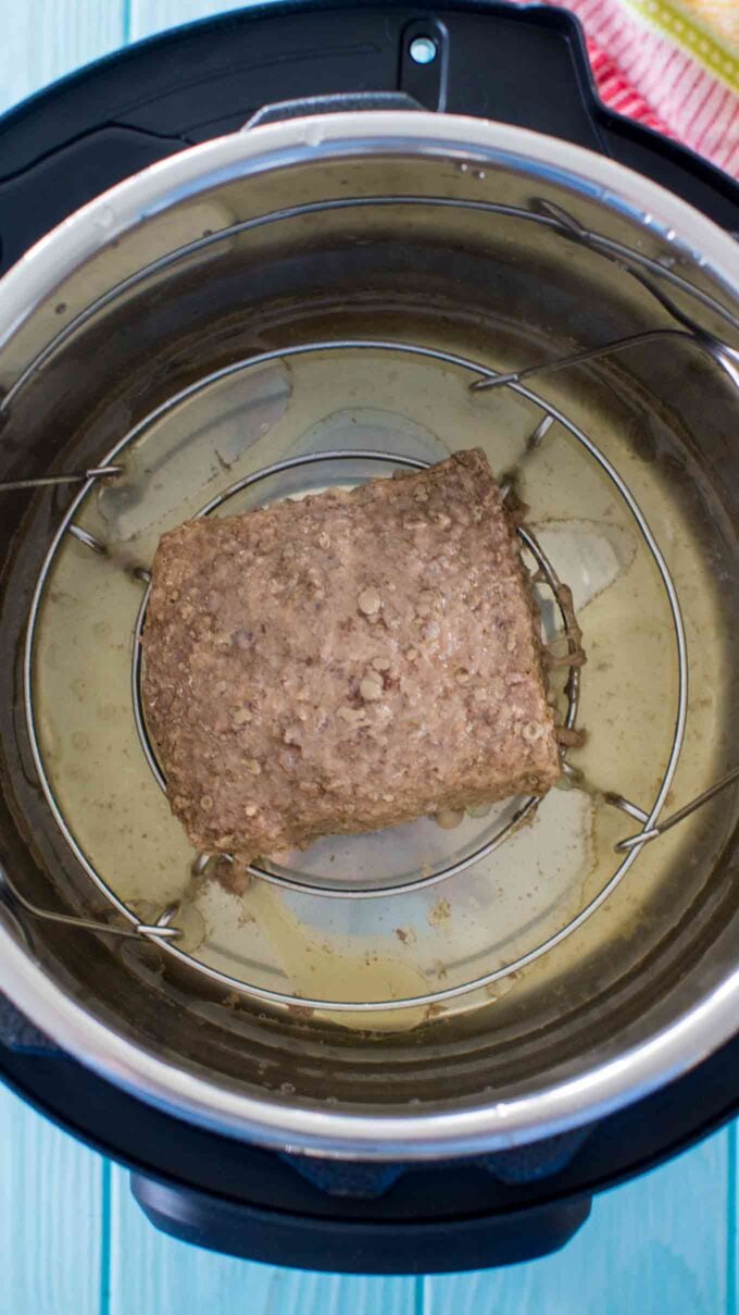 a block of cooked ground beef in the instant pot