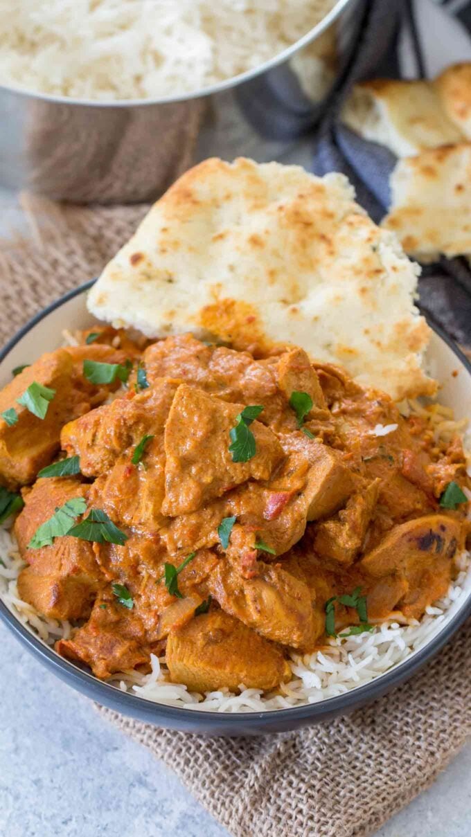 Pressure cooker chicken tikka masala over white rice and naan.