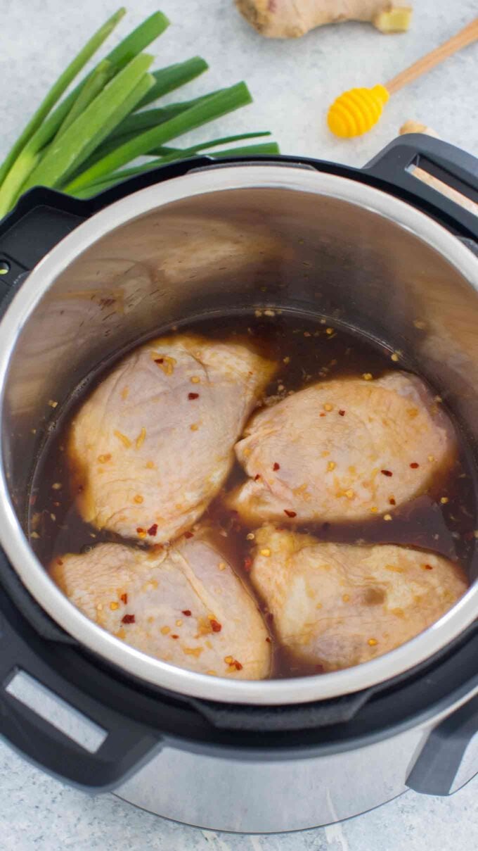 Image of honey garlic chicken thighs in the instant pot.