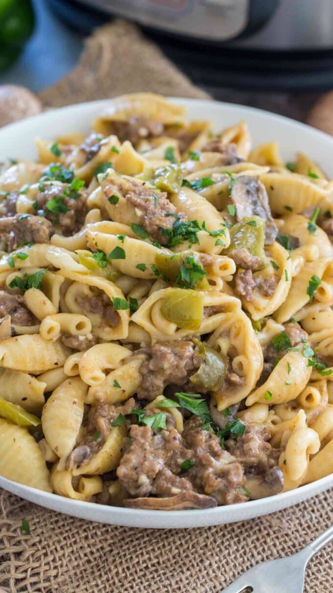creamy instant pot philly cheesesteak pasta with past shells with ground beef