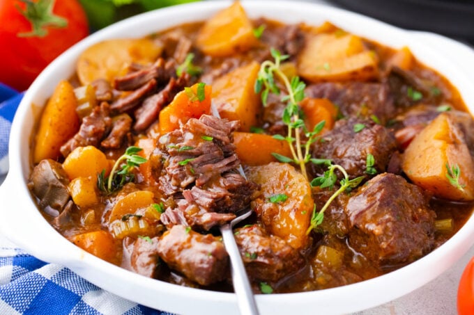 A bowl of tender Instant Pot beef Bourguignon.