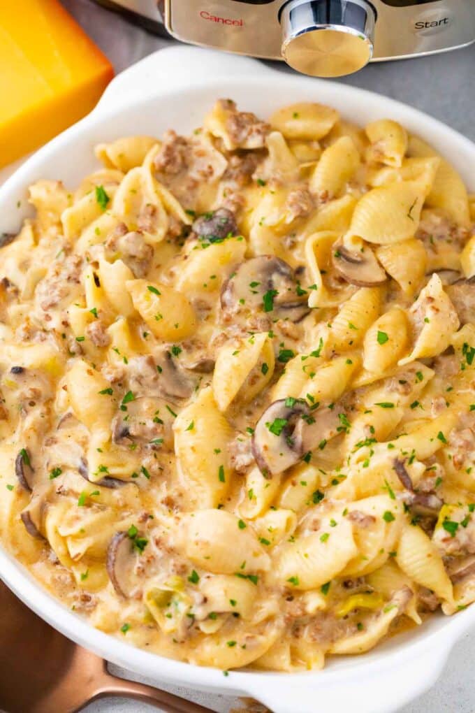 overhead shot of cheesy ground beef instant pot philly cheesesteak pasta