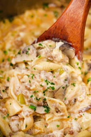 a spoonful of cheesy instant pot philly cheesesteak pasta