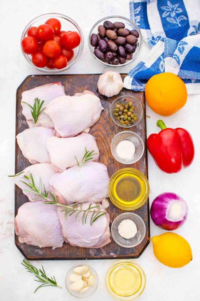 overhead shot of one pan mediterranean chicken ingredients on a table