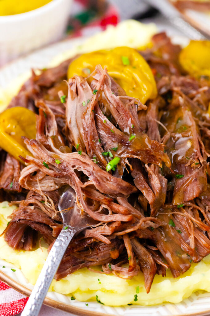 A forkful of incredibly tender instant pot Mississippi pot roast.