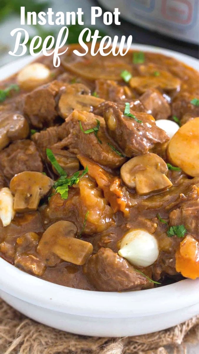 Picture of homemade beef stew in a white bowl.