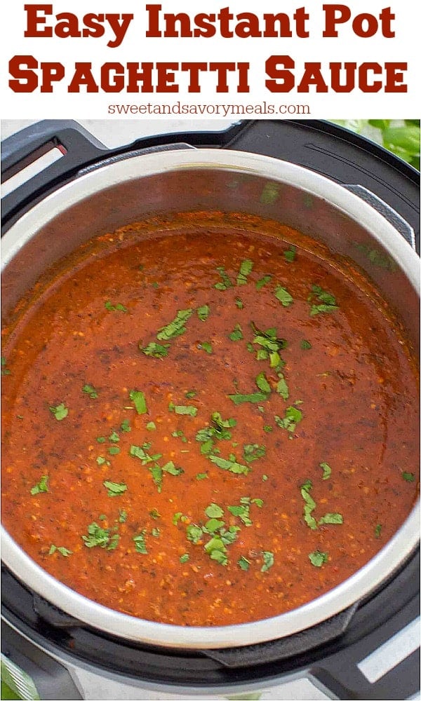 Instant pot spaghetti sauce garnished with fresh basil