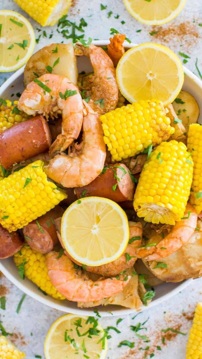 instant pot shrimp boil with sausage and corn on the cob in a serving plate