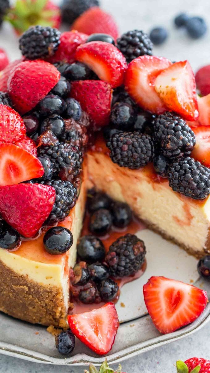 sliced instant pot cheesecake with berries