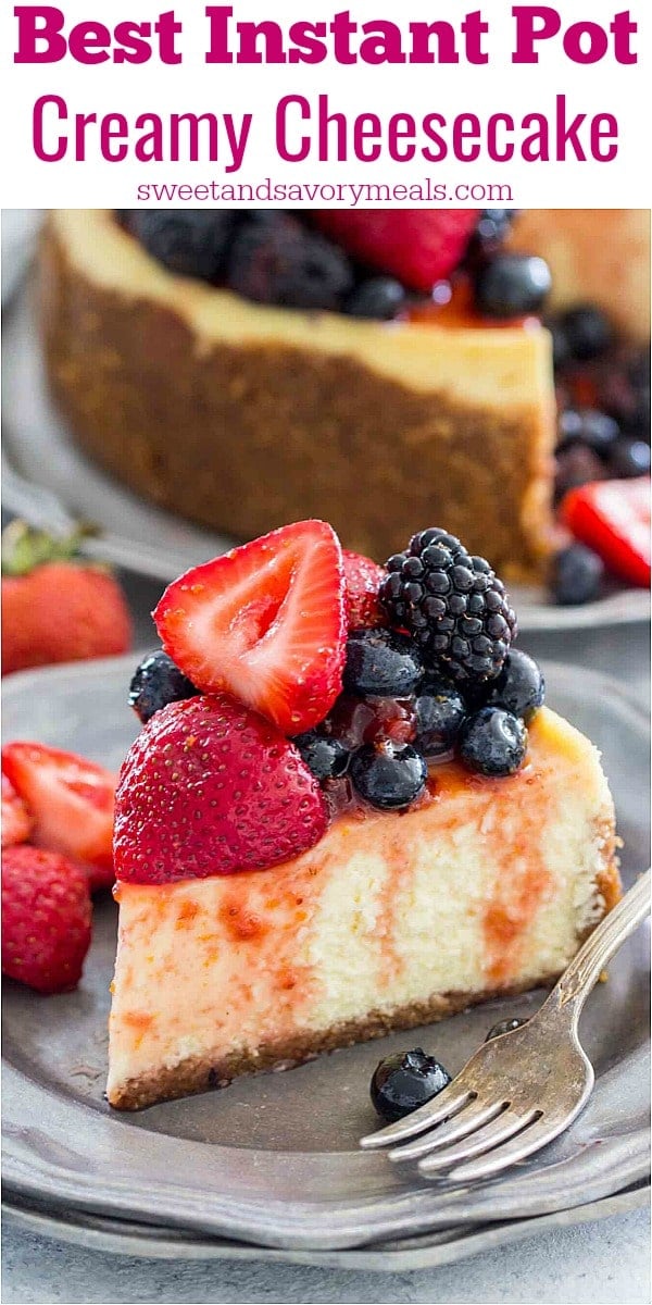 instant pot cheesecake topped with berries on a silver plate