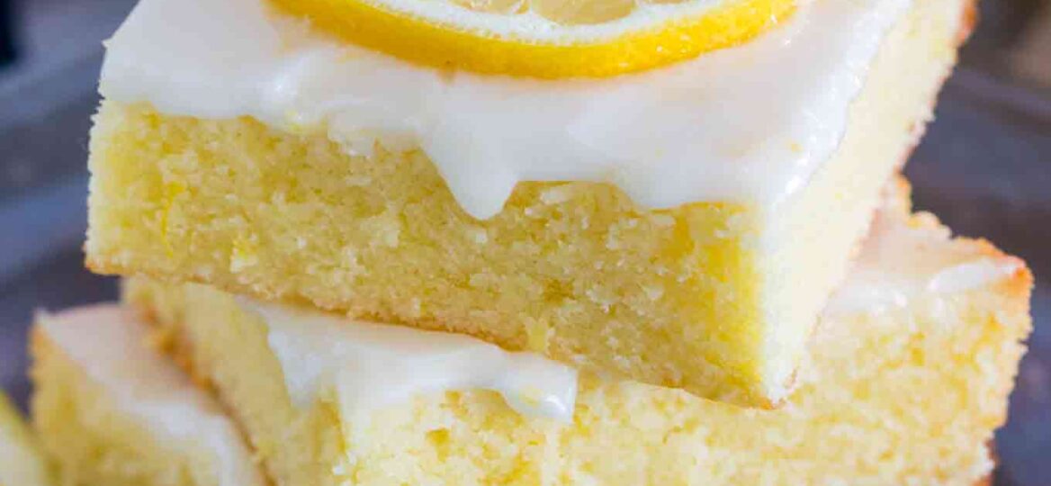 Easy to make One Bowl Lemon Brownies are so buttery and full of fresh lemon flavor. Made with fresh lemon juice, lemon zest and topped with lemon glaze.