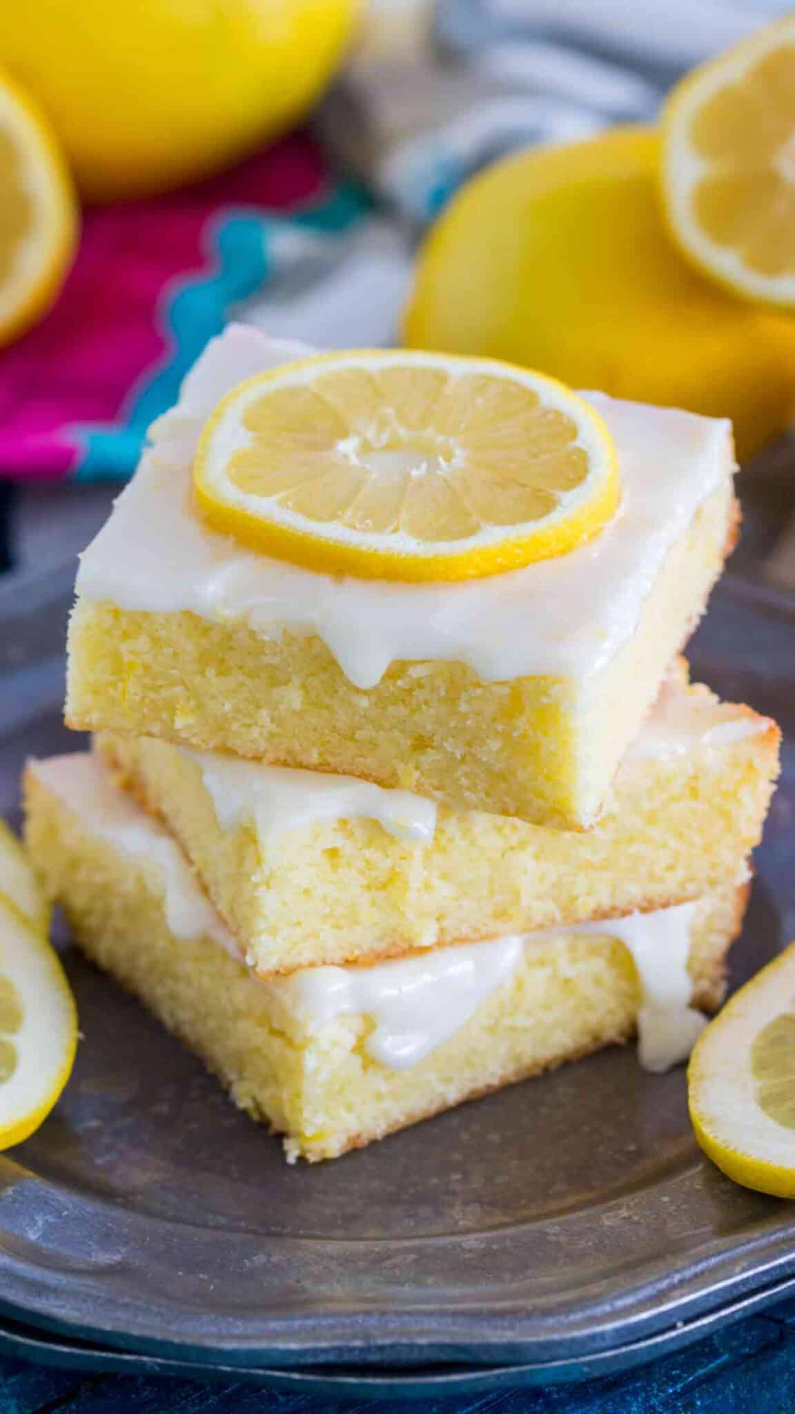 Easy to make One Bowl Lemon Brownies are so buttery and full of fresh lemon flavor. Made with fresh lemon juice, lemon zest and topped with lemon glaze.