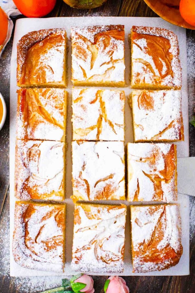 overhead shot of sliced persimmon cheesecake pound cake bars