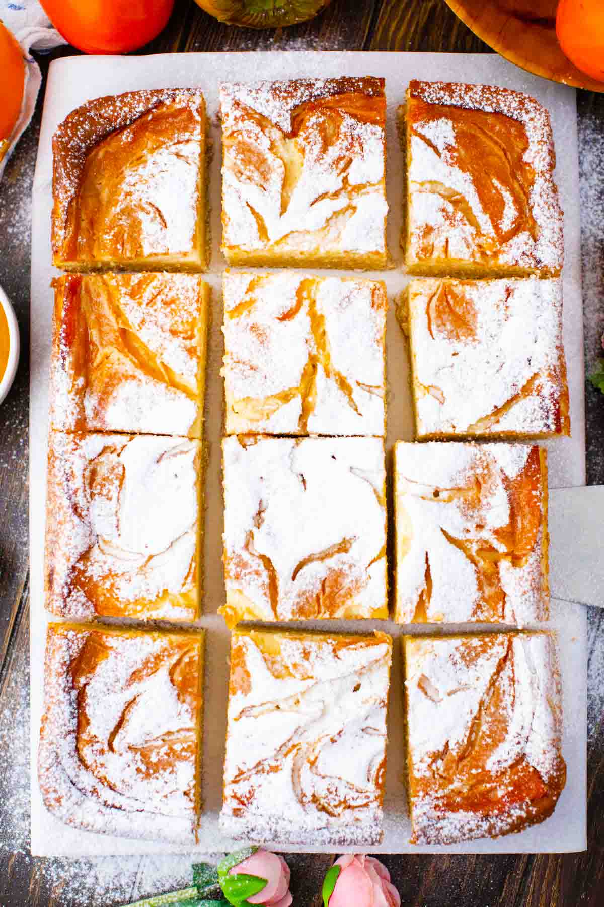 overhead shot of sliced persimmon cheesecake pound cake bars