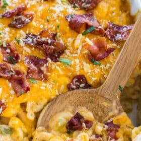 Cheesy Crack Chicken Casserole is the perfect dish to feed a large crowd. Deliciously cheesy and loaded with tender chicken and topped with crispy bacon.