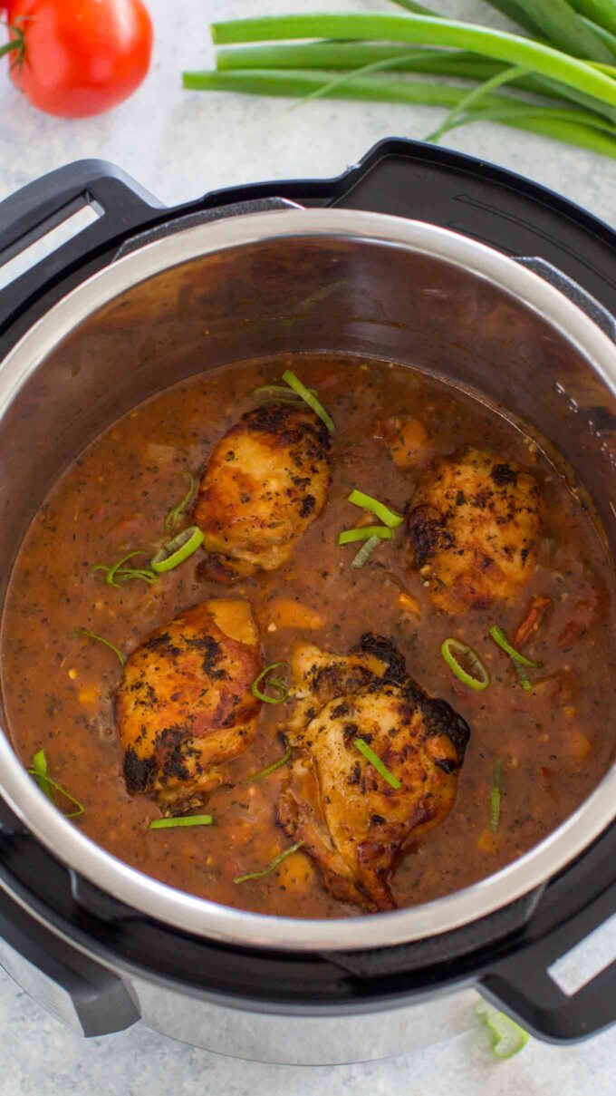 overhead shot of Instant Pot Chicken Cacciatore in sauce