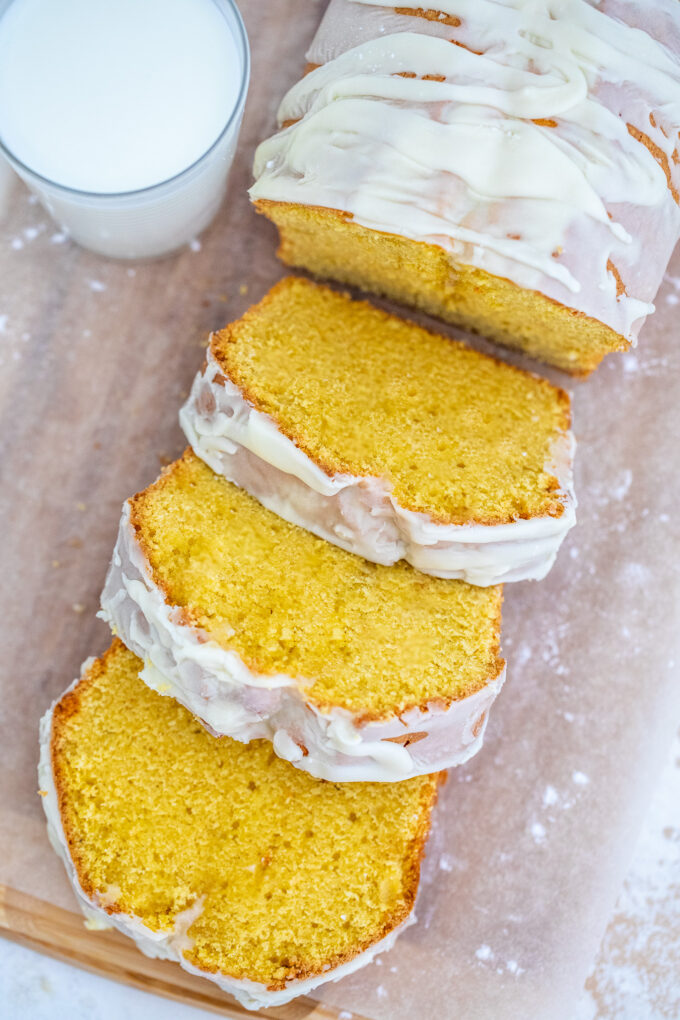 Pumpkin Pound Cake is sweet, buttery and full of pumpkin pie flavor. Topped with a hefty amount of white chocolate whipped ganache, makes it the perfect fall treat. #pumpkin #pumpkinspice #falldesserts #poundcake #sweetandsavorymeals