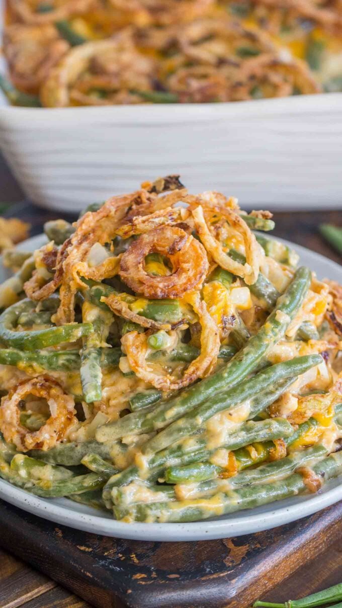 Homemade green bean casserole on a plate topped with French fried onions