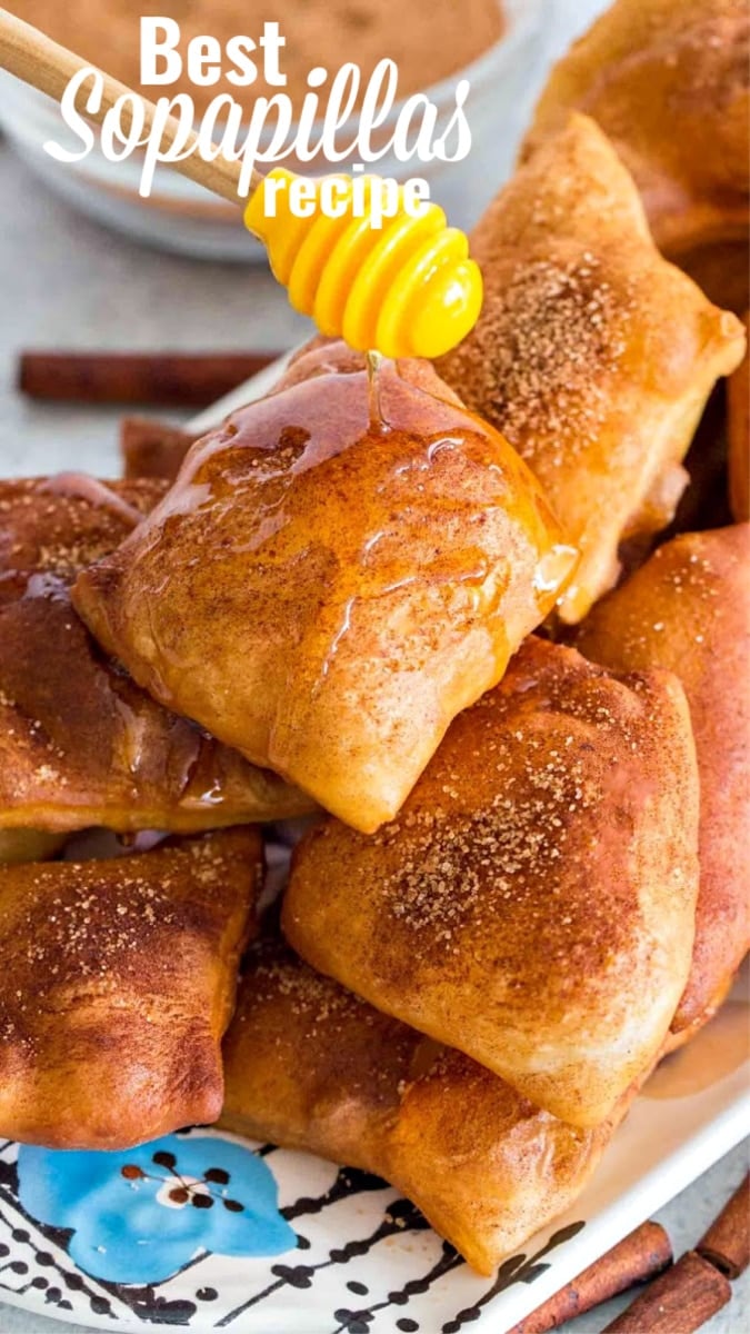 Picture of sopapillas topped with honey and cinnamon.