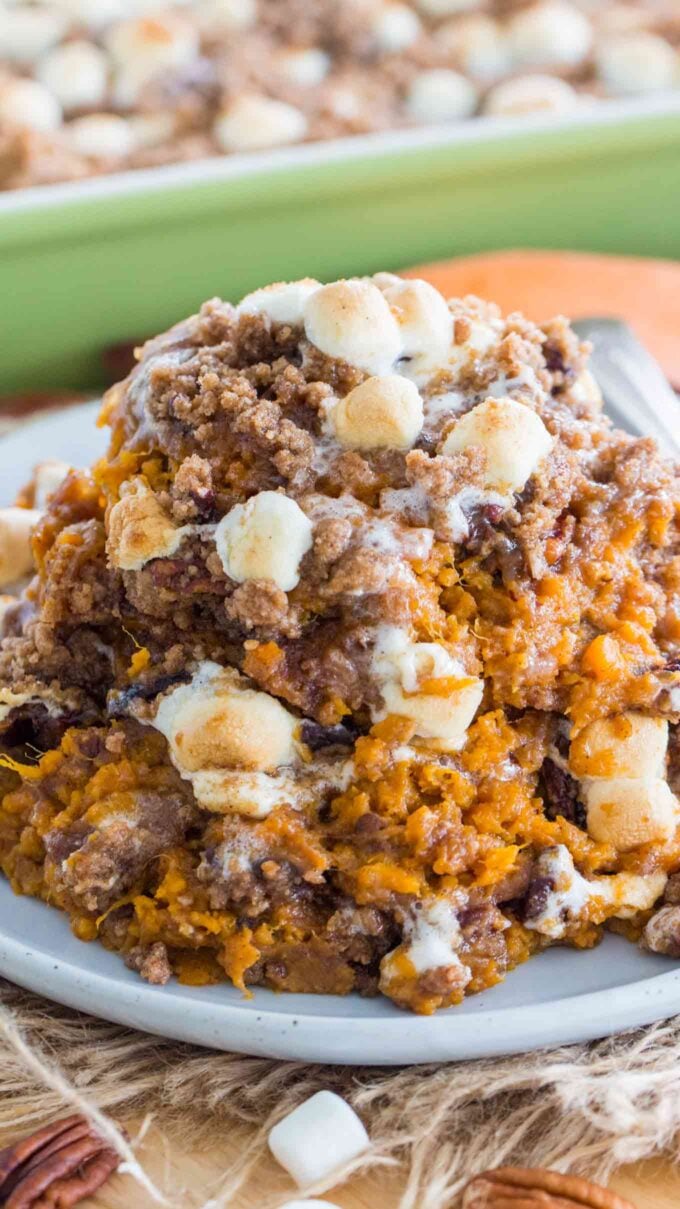 Homemade sweet potato casserole with marshmallows on a plate