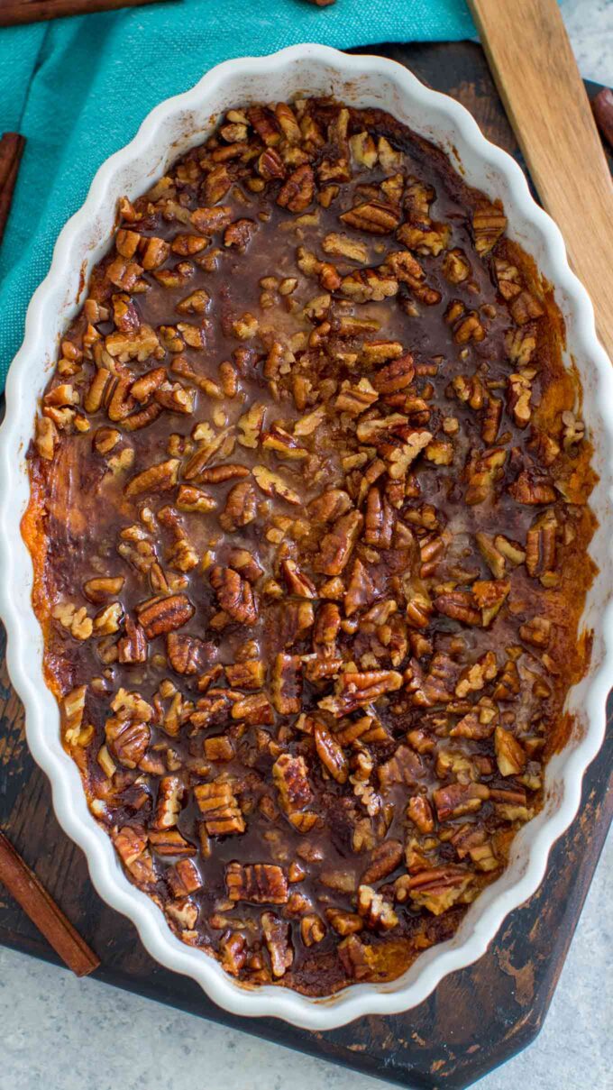 overhead shot of sweet potato souffle in a white casserole dish