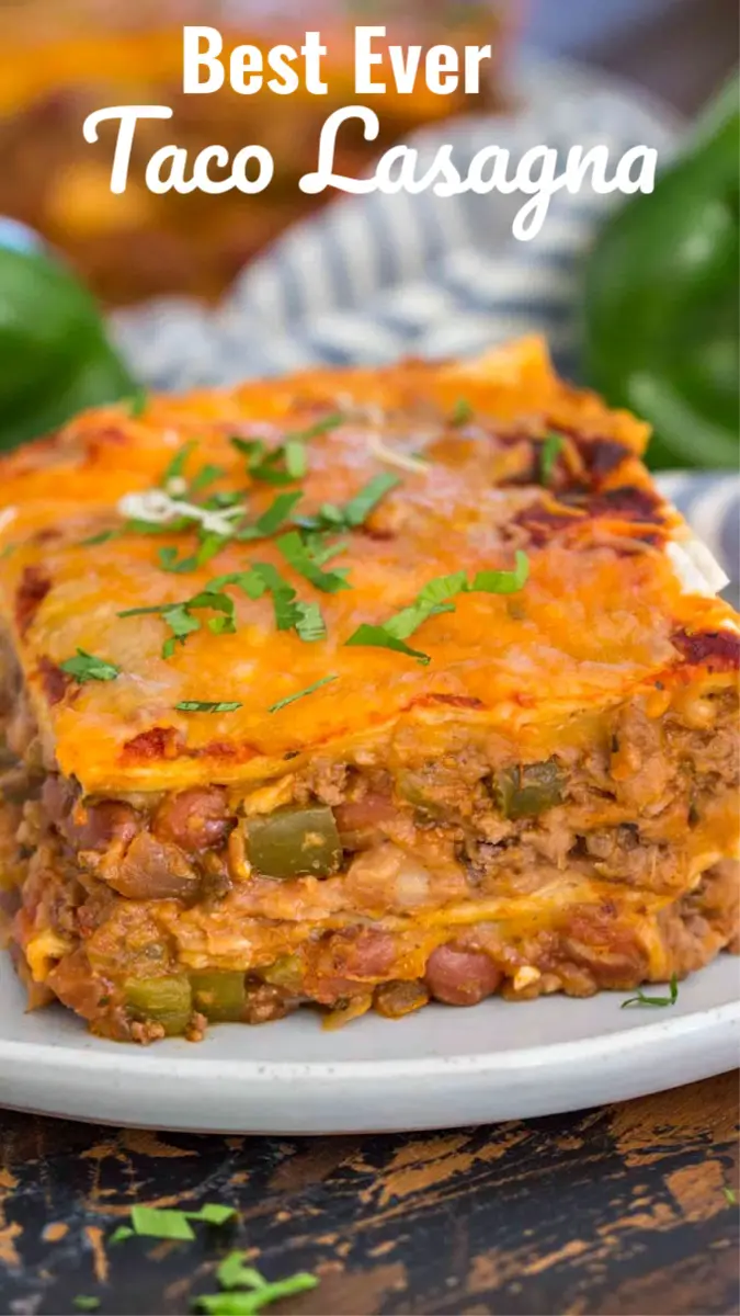 taco lasagna slice on a plate with text overlay that reads best ever taco lasagna