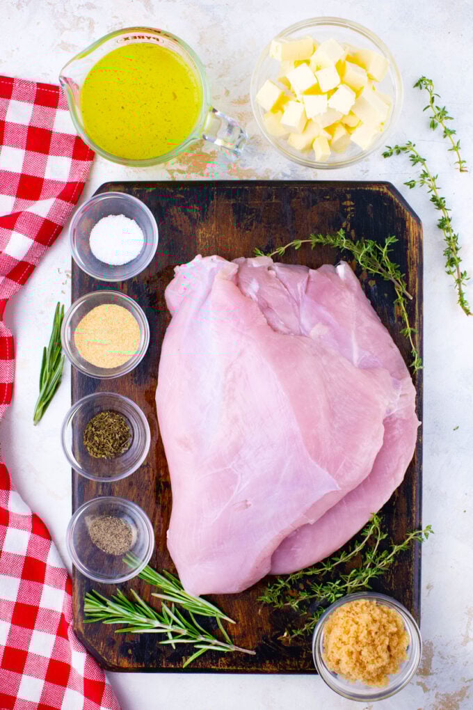 Instant pot turkey breast ingredients arranged on a white surface.