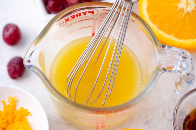 A cup of orange juice.