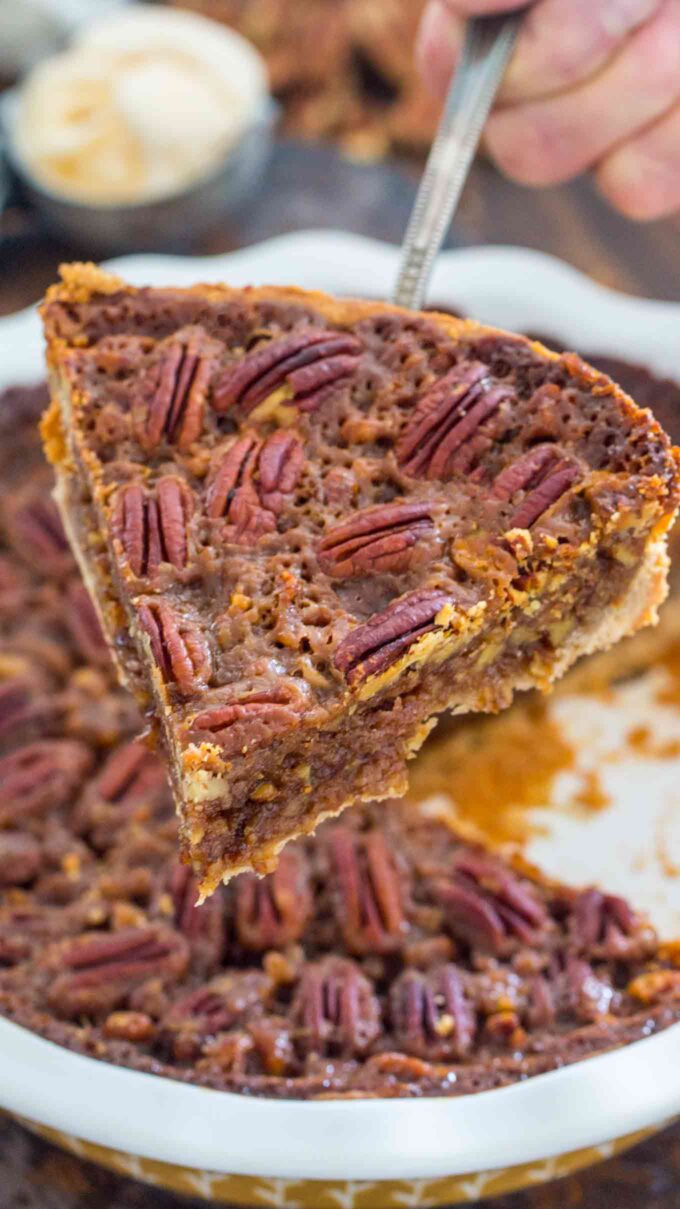 a slice of Homemade Pecan Pie on a serving spatula