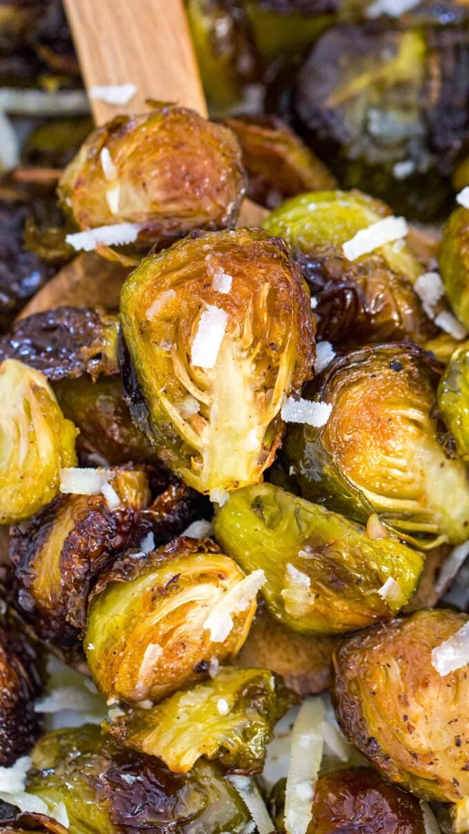 Roasted Brussels Sprouts topped with shredded parmesan cheese