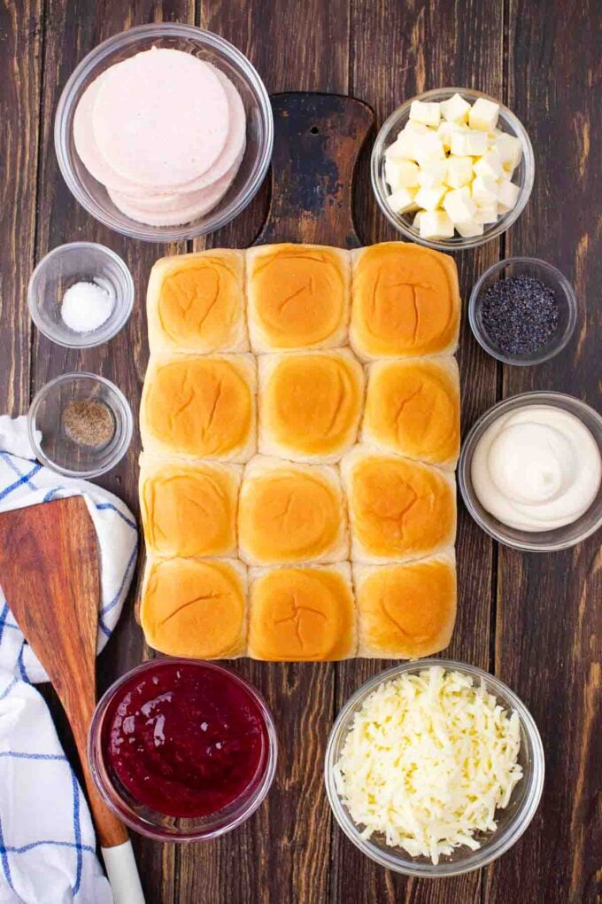 cheesy turkey sliders ingredients arranged on a table