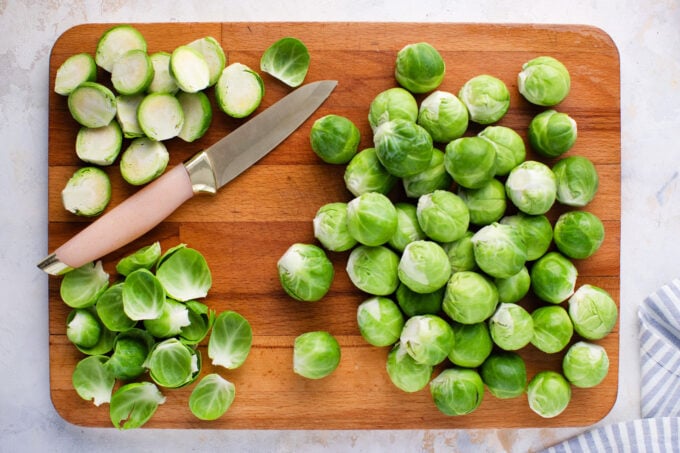 Brussels sprouts on a cutting board.