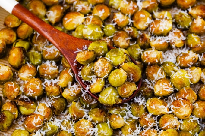 Crispy crispy roasted Brussels sprouts on a baking sheet.