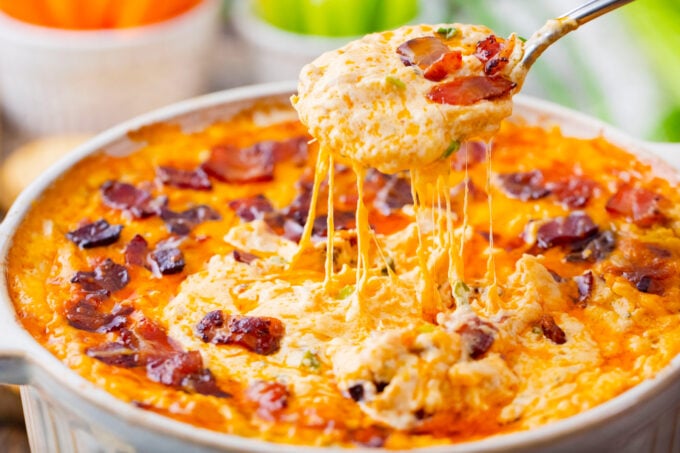 A spoonful of very cheesy Buffalo crack chicken dip.