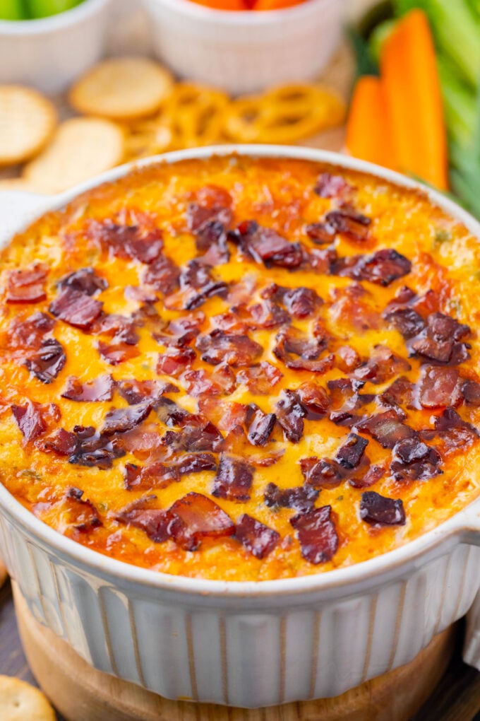 Perfectly baked Buffalo crack chicken dip with bacon.
