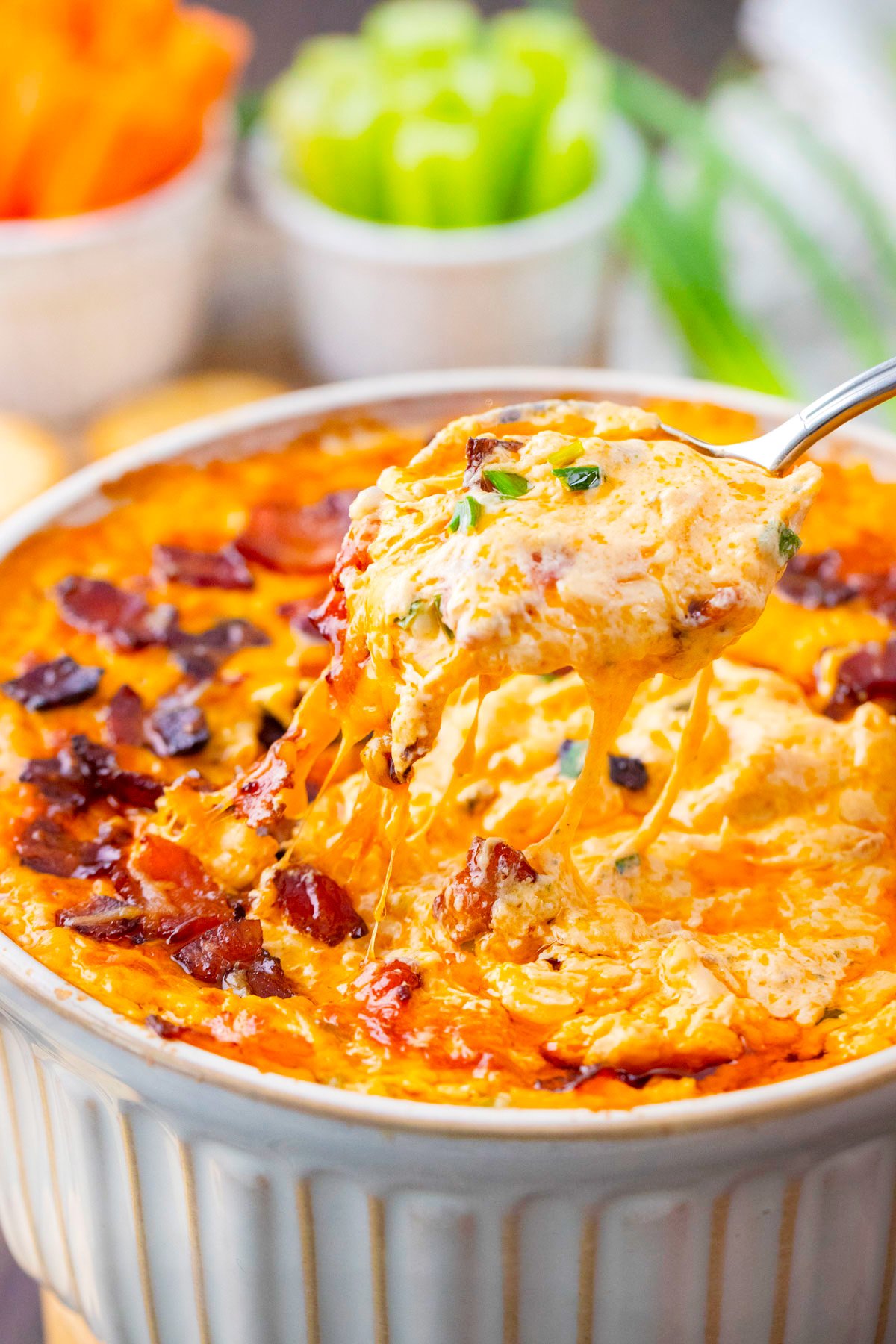 A spoonful of very cheesy, homemade Buffalo crack chicken dip/