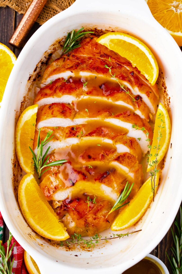 Overhead shot of oven roasted turkey breast with honey orange sauce.