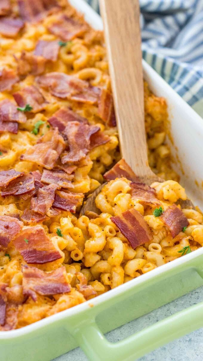Easy Buffalo Chicken Mac and Cheese Casserole next to a wooden spoon