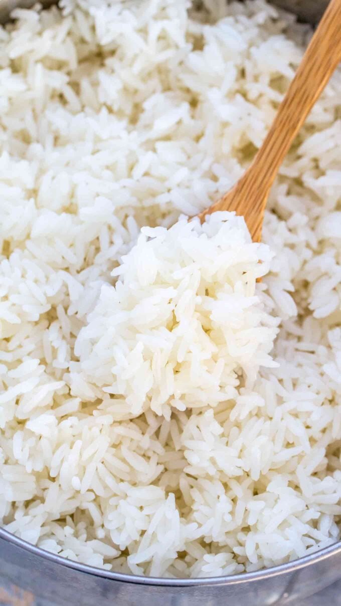 White rice on a wooden spoon