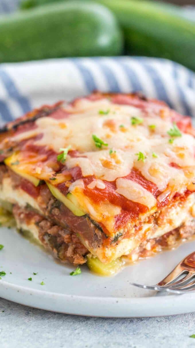 Zucchini lasagna slice on a white plate